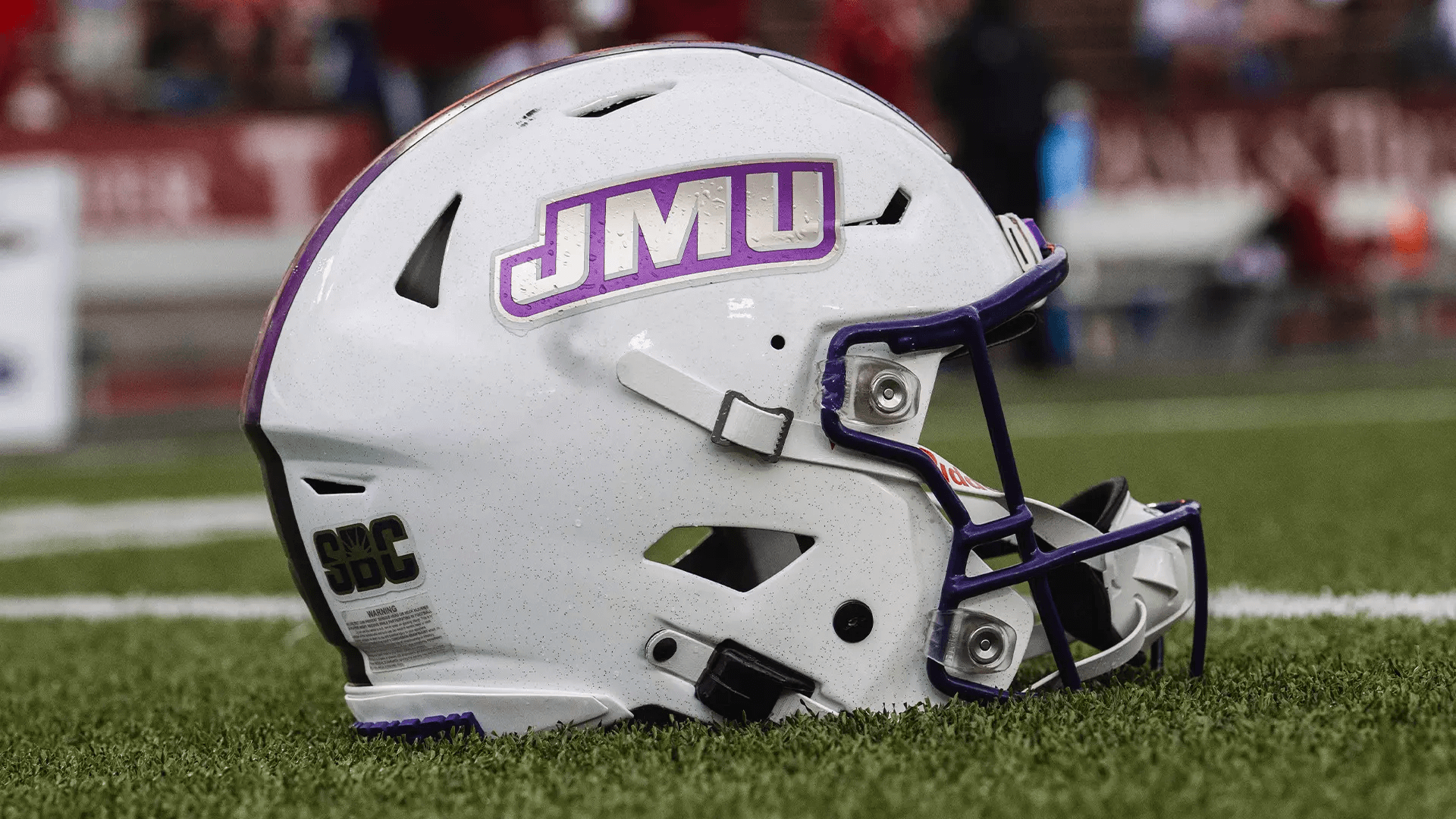 jmu football helmet on the ground