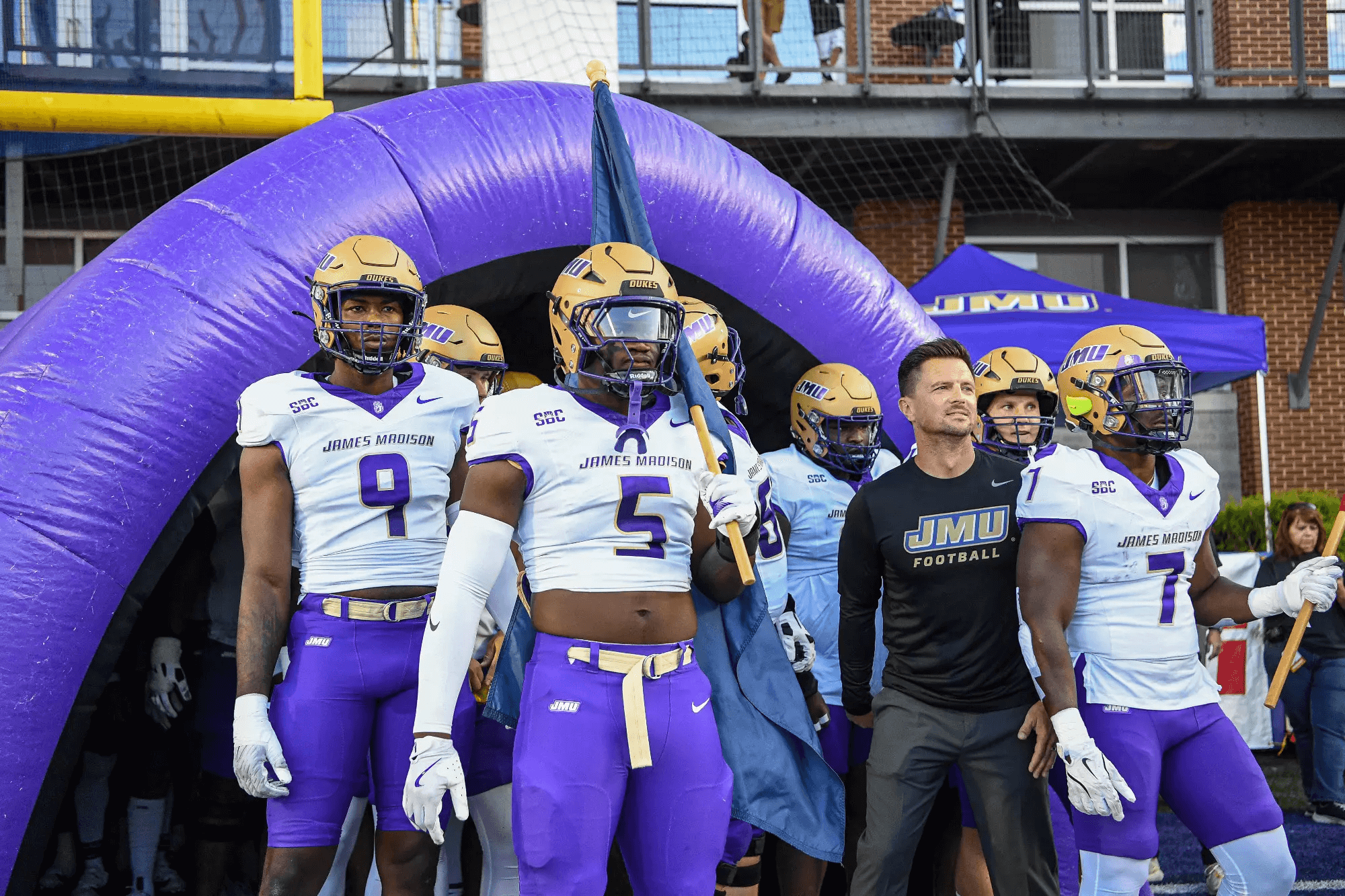 jmu football in tunnel